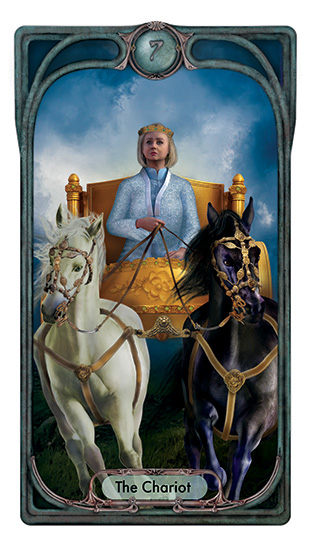 A mature woman dressed in a pale blue robe rides a golden chariot drawn by a black and a white horse against a backdrop of turbulent clouds.