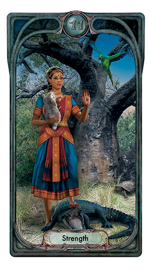 A woman dressed in a Bharatanatyam costume surrounded by exptic animals with her foot on the head of an alligator