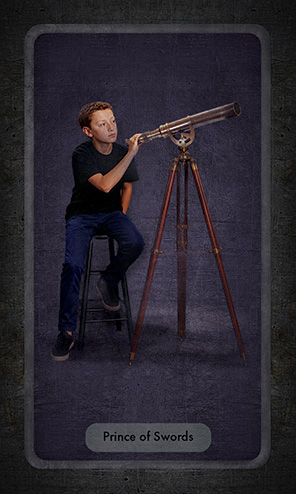 The Prince of Swords shows a young Galileo in modern clothing perched on a stool about to look through an old-fashioned brass telescope.